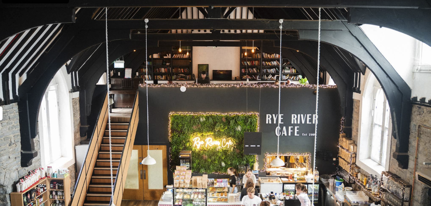 Interior of Rye River Cafe in Kilcock, vaulted ceiling, timber rafters and the cafe counter